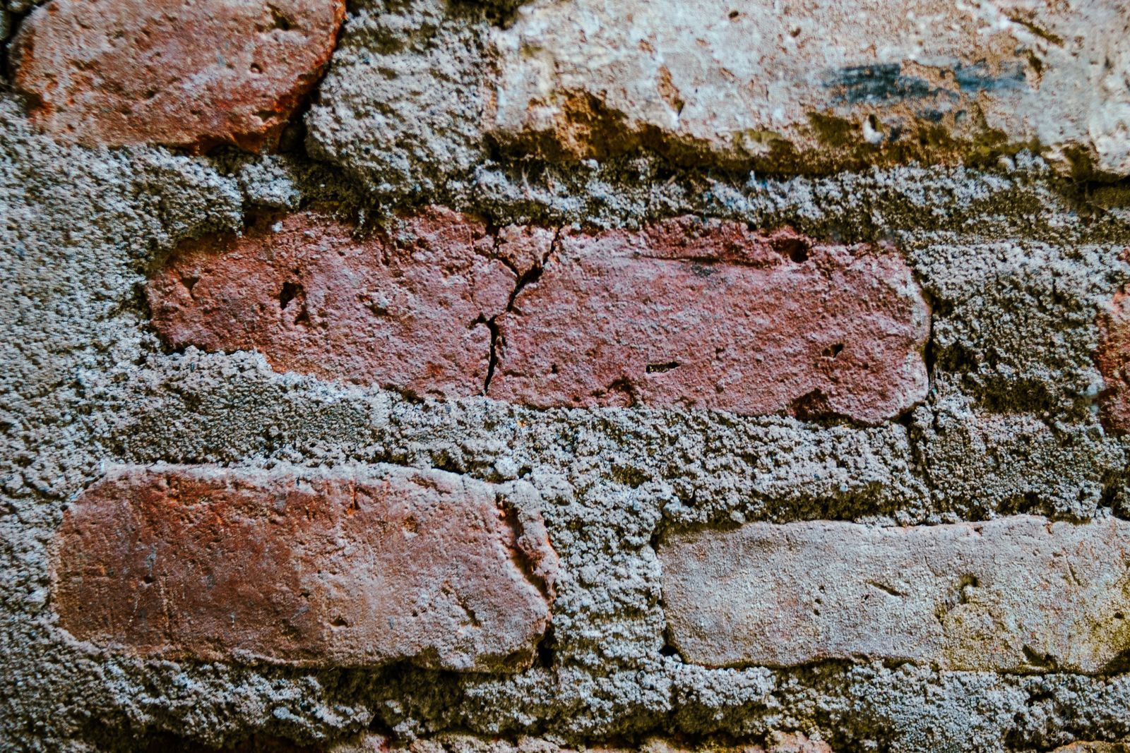 Cracked brick and crumbling mortar